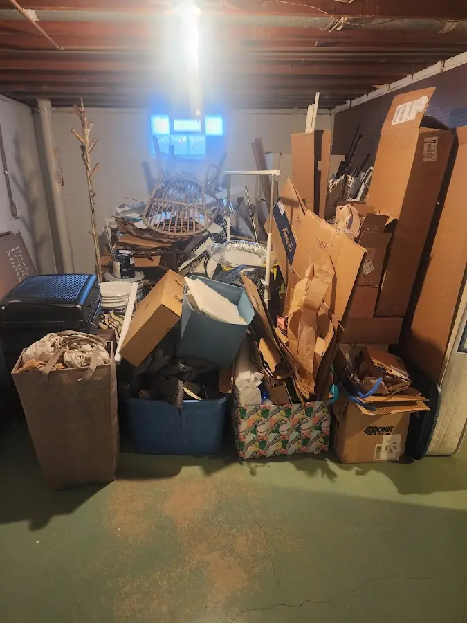 Roll-off dumpster container at job site for 2 Yard Dumpster Rental in Grand Saline